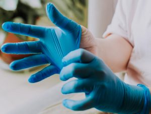Why do experts not suggest latex gloves?